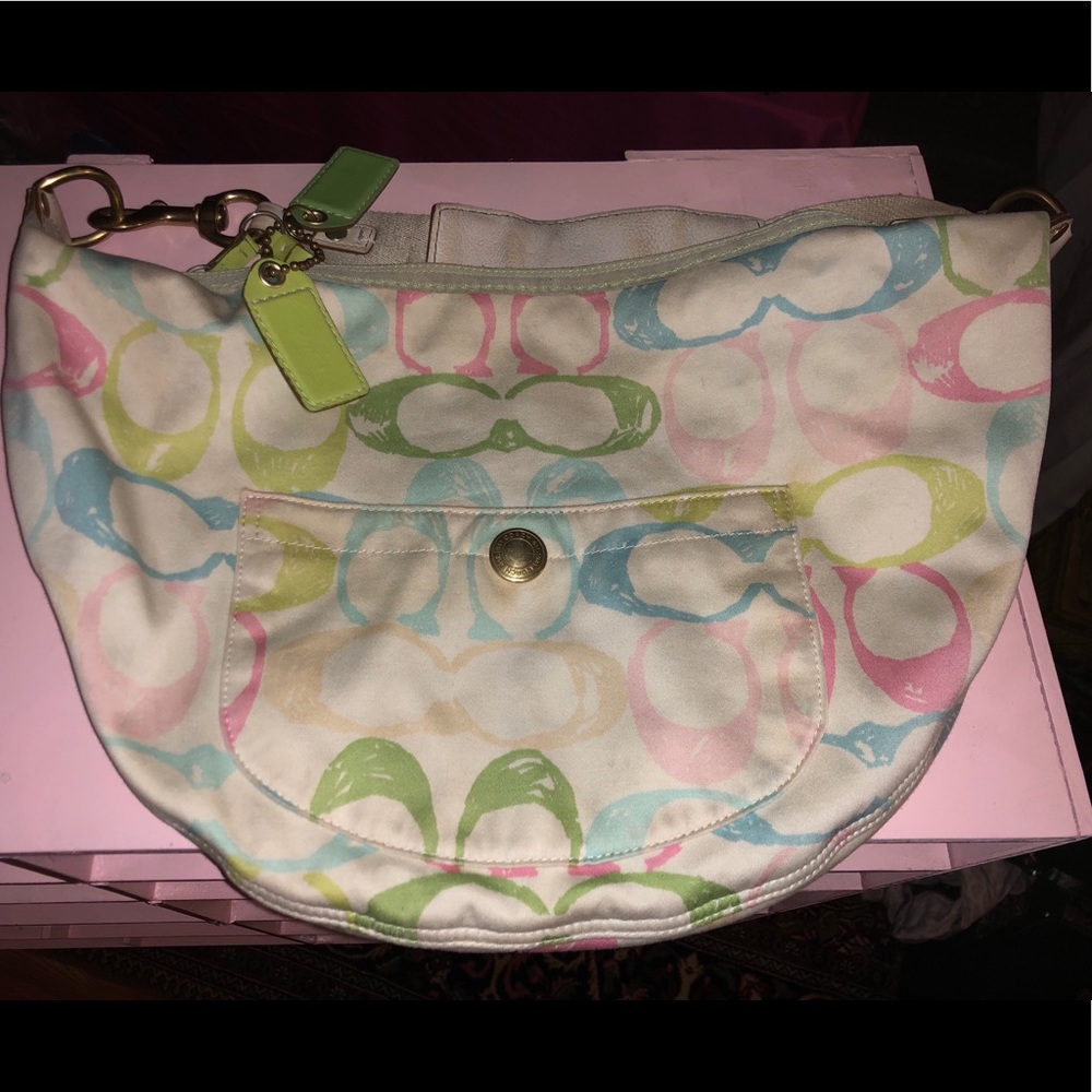 Multi-colored coach bag.